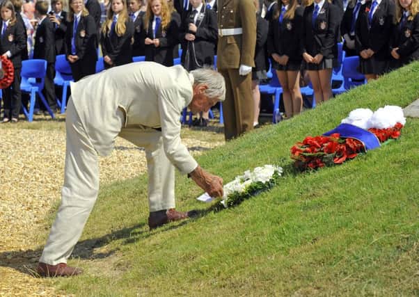 COPP survivor Jim Booth lays a wreath on The COPP Memorial
on Hayling Island in 2015. Picture: Malcolm Wells