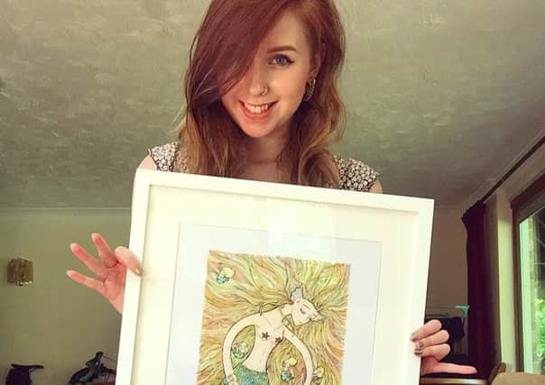 Fareham based artist and writer Yasmin Thornber with one of her works.