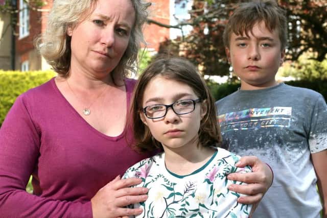 Ros Pawling and her children, Simeone, 12, and Bethany, 10, pictured in Gosport. 
 Picture by Chris Moorhouse