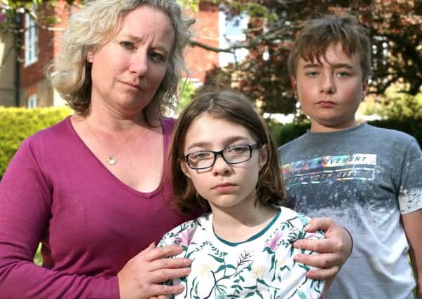 Ros Pawling and her children, Simeone, 12, and Bethany, 10, pictured in Gosport. 
 Picture by Chris Moorhouse