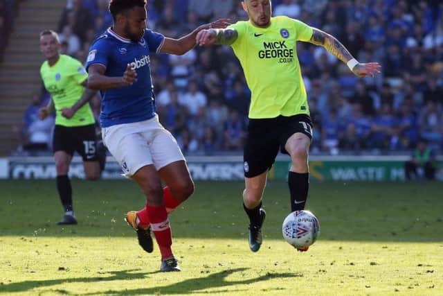 Marcus Maddison in action for Peterborough against Pompey on the final day of the season