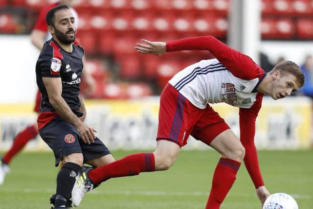 Erhun Oztumer, right, is available on a free transfer