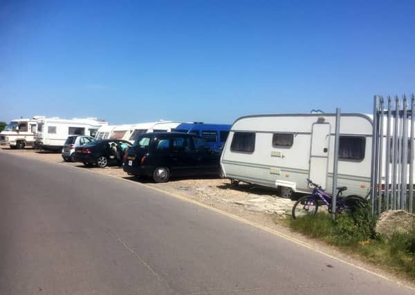 Travellers camp caravans off road at Ferry Road site