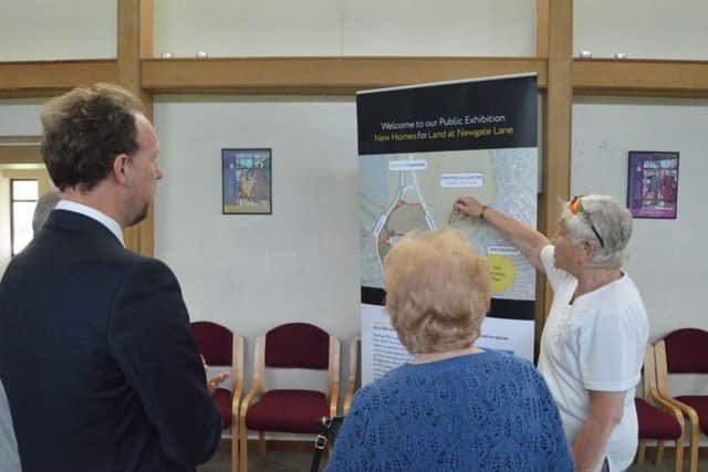 Residents chat to director of transport Tony Jones about the Newgate Lane development plans