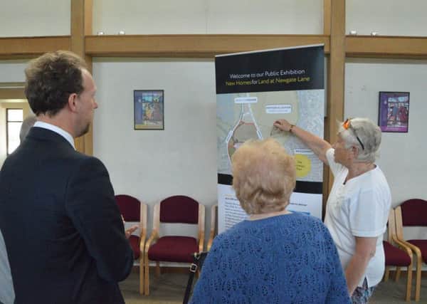 Residents chat to director of transport Tony Jones about the Newgate Lane development plans