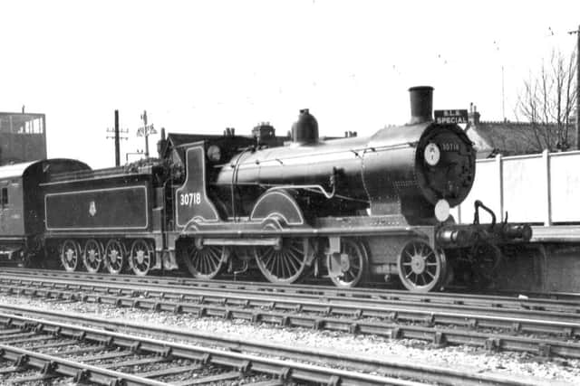 ClassT9 30718 on a Stephenson Locomotive Society special waits for the off at Havant
Pictured at Havant we see a class T9 at the head of a Stephenson Locomotive Society special. Can anyone confirm the date?
Picture: Barry Cox collection