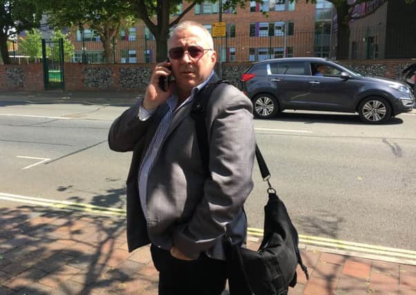 Lee Wilson, 52, of Aylesbury Road, Fratton, outside Portsmouth Magistrates' Court after he admitted two charges of fraud by false representation by posing as being from a property management company.