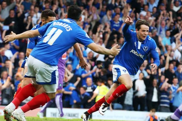 Marc McNulty celebrates scoring the opening goal of the League Two play-off match-up with Plymouth at Fratton Park Picture: Joe Pepler