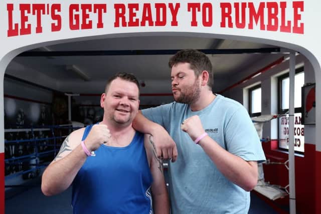 Brothers Jamie (left) and Darryn McClelland will have a fundraising boxing match in a month's time, on behalf of the Amelia-Mae Foundation. They are pictured at Bessey's Gym, Leigh Park Community Centre, Havant                                     Picture: Chris Moorhouse           Wednesday 23rd May 2018         FOR EDITORIAL USE ONLY PPP-180523-164956006