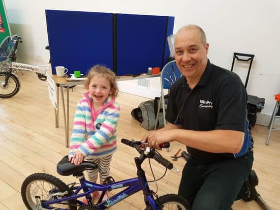 Stuart Grattan from Bikepro Servicing helping Whiteley Church with their cycle maintenance session