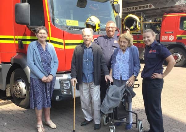 Left to right, residents Pam Thompson, Les Hale and Audrey Hopkins and staff firefighter Beth Medway and community cupport officer Gary Shawyer