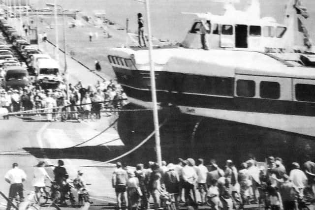 SRN4 hovercraft Swift is towed across Marine Parade West to HMS Deadalus. PPP-180626-221613001