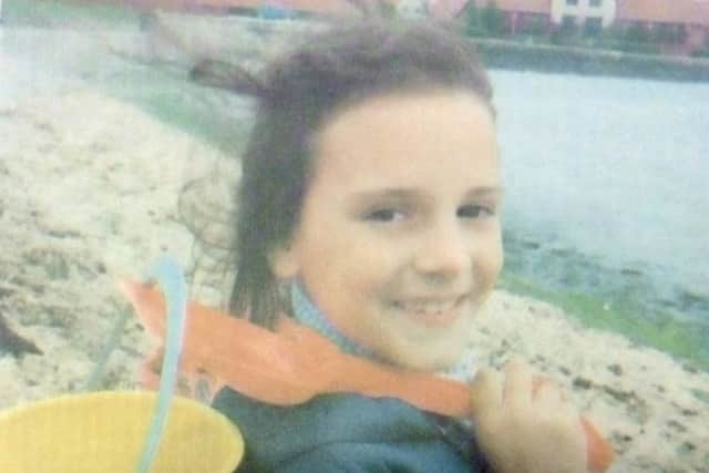 Holly Young, seven, at Paulsgrove beach. PPP-180619-094144006