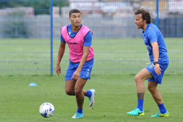 Christian Oxlade-Chamberlain in pre-season action last summer