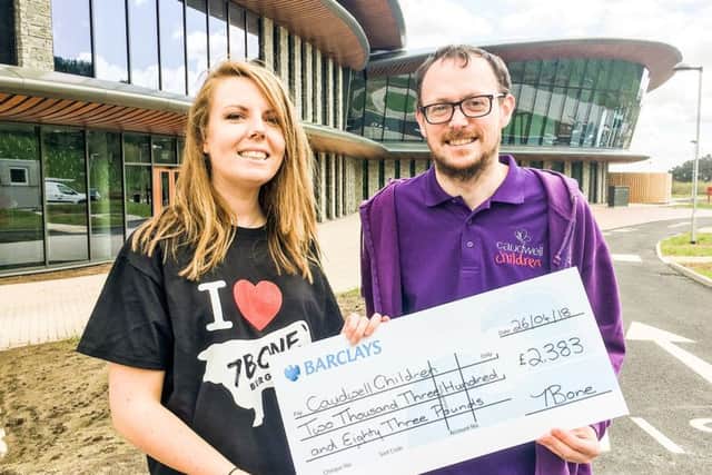 Michelle Robinson (Marketing Executive 7 Bone Burger Co) with Stuart Graham (Caudwell Children)