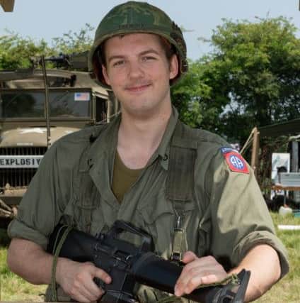Andrew Talpaert takes guard duty with 82nd Airborne re-enactment group.
Picture: Keith Woodland 180297-04