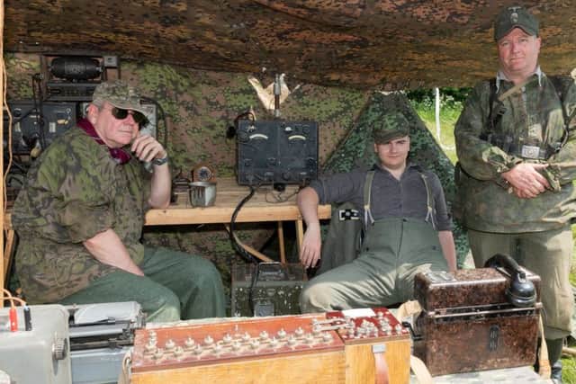 Members of the 2nd Battle group relax in their communication tent.
Picture: Keith Woodland 180297-07