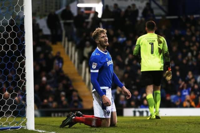 Former Pompey striker Michael Smith has earned promotion with Rotherham.