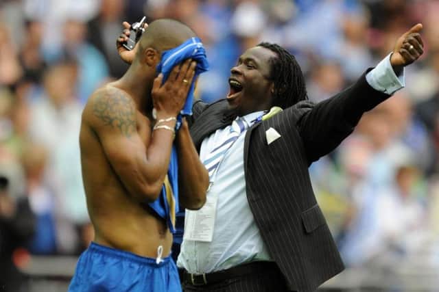 Linvoy Primus celebrates Pompey's FA Cup triumph.