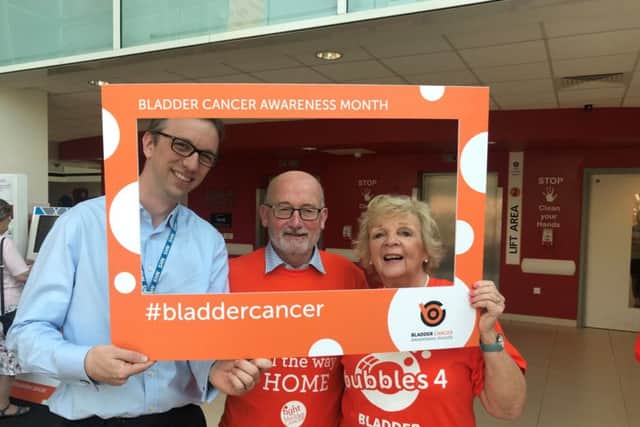 Colin Weborn, centre, with urologist Daniel Wilby and Fight Bladder Cancer volunteer, Linda Rush at Queen Alexandra Hospital, Cosham