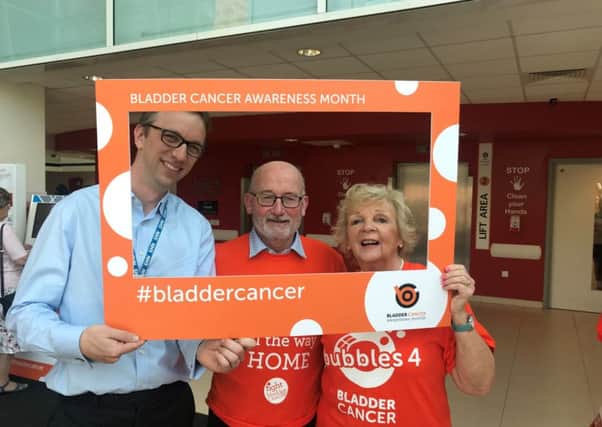 Colin Weborn, centre, with urologist Daniel Wilby and Fight Bladder Cancer volunteer, Linda Rush at Queen Alexandra Hospital, Cosham