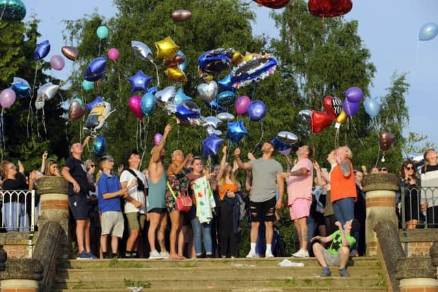 Family and friends gather to release balloons in memory of Tommy Cowan who died after being at The Mutiny Festival Picture by:  Malcolm Wells