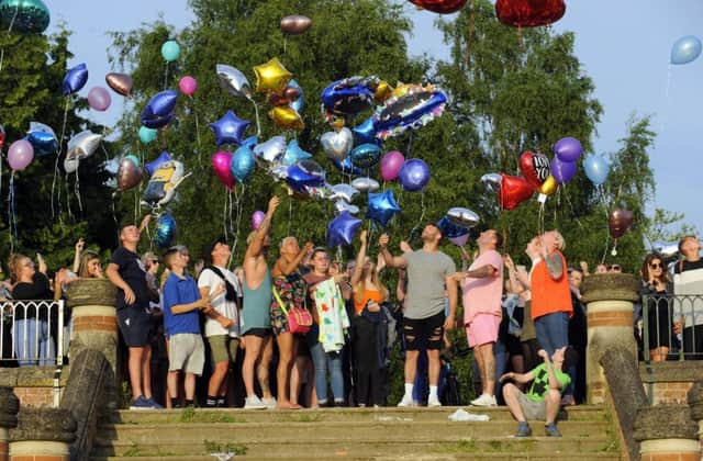 Family and friends gather to release balloons in memory of Tommy Cowan who died after being at The Mutiny Festival Picture by:  Malcolm Wells
