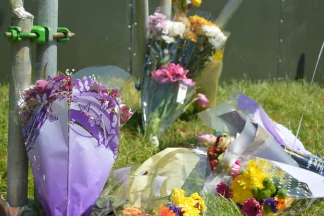 Flowers have been left in King George V Playing FIelds in Cosham, as a tribute to Georgia Jones and Tommy Cowan, who both died at Mutiny Festival over the weekend. Picture: David George