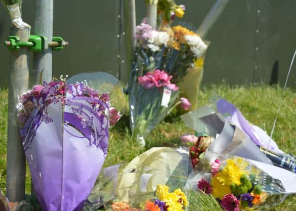 Flowers have been left in King George V Playing FIelds in Cosham, as a tribute to Georgia Jones and Tommy Cowan, who both died at Mutiny Festival over the weekend. Picture: David George