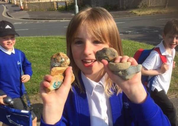 One of the students from Gomer Junior School found a number of 'Gomer Rocks' during Walk to School week. Picture: Sarah Bottriell