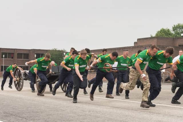 HMS Collingwoods fieldgun teams went head to head in the 12 pounder trophy. This prelude to the actual competion see's HMS Collingwood A & B teams compete against each other in timed runs. Picture: Keith Woodland