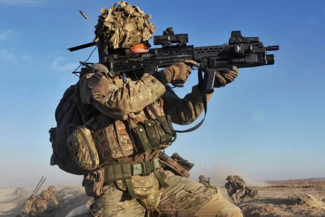 A soldier with the 4th Mechanised Brigade is pictured engaging the enemy during Operation Qalb in Helmand, Afghanistan. PPP-160202-120854001