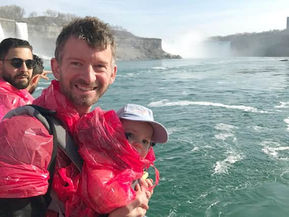 Steve Canavan using his daughter Mary as a human shielf at Niagara Falls