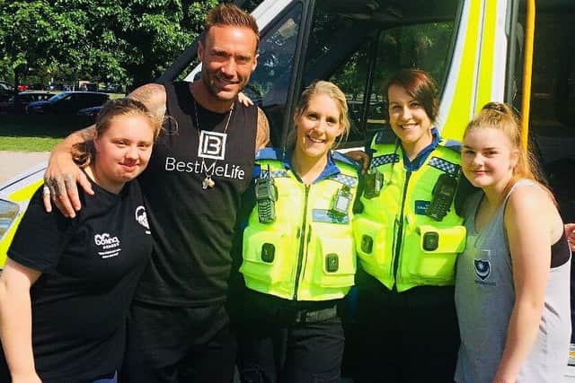 Fans snap a selfie with TV personality Calum Best at the Southsea Fitness Festival PHOTO: Portsmouth police