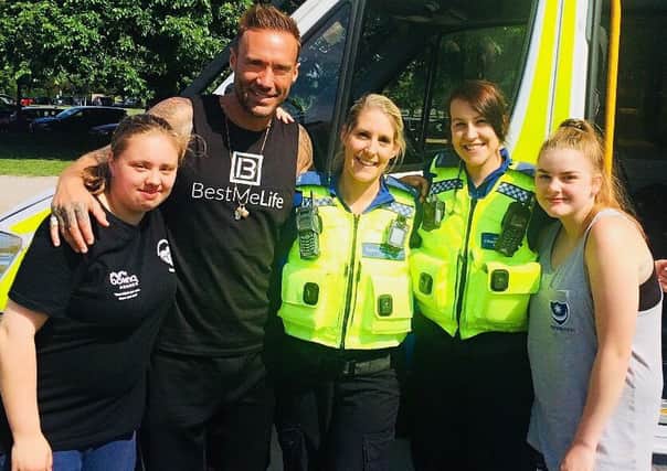 Fans snap a selfie with TV personality Calum Best at the Southsea Fitness Festival PHOTO: Portsmouth police