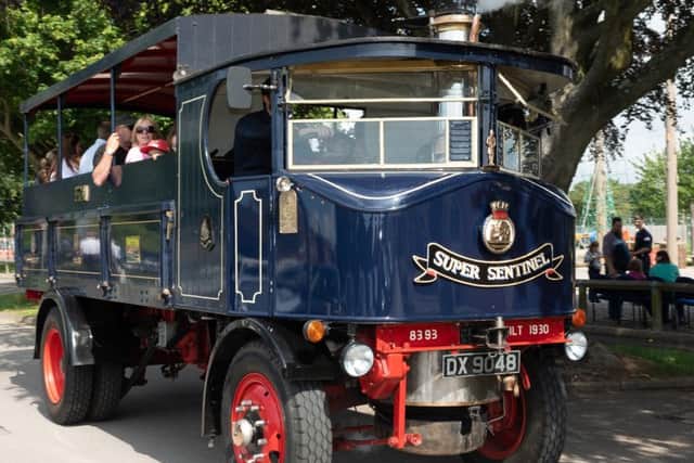 Visitors  take a ride in the Sentinel Steam Lorry
(180206-182319006)