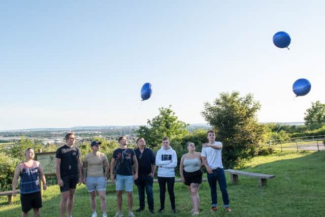 Tommy Cowan's South Downs College uniformed services friends release their balloons in his memory at Fort Purbrook. 
Picture: Vernon Nash (180391-0013) PPP-180306-193017006