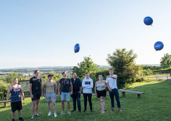 Tommy Cowan's South Downs College uniformed services friends release their balloons in his memory at Fort Purbrook. 
Picture: Vernon Nash (180391-0013) PPP-180306-193017006