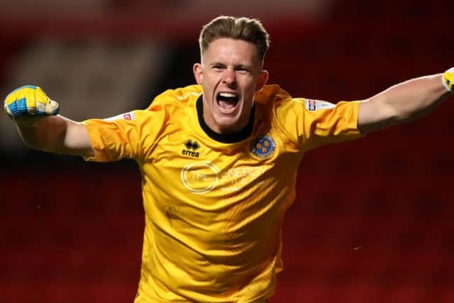 Manchester United keeper Dean Henderson spent last season on loan at Shrewsbury
