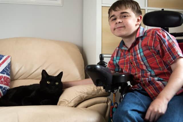 Jared Bignold and his cat Salem
