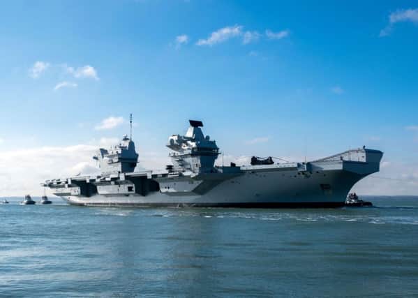 HMS Queen Elizabeth when she returned to Portsmouth Harbour after sea trials. Photo: Steve Parsons/PA Wire