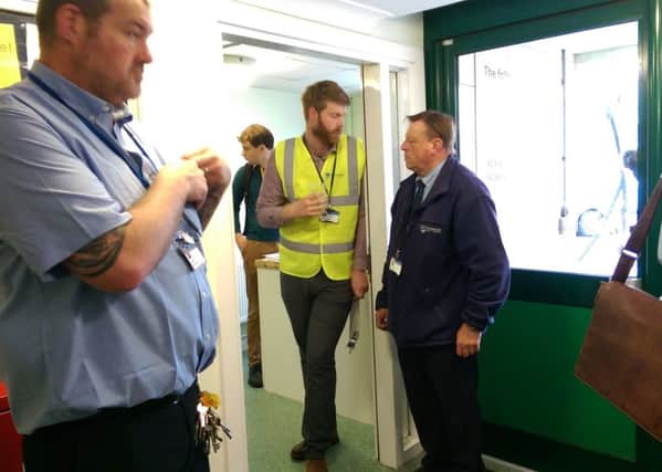 Council workers inside Horatia House today in Portsmouth. Picture: Malcolm Wells