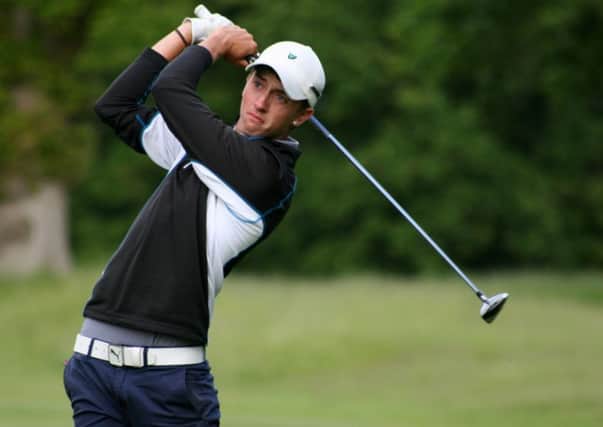 Rowlands Castle's Billy McKenzie tees off at the 13th at Brokenhurst Manor in his Quarter Final against Rowlands Castle's Tom Robson, at the Hampshire Isle of Wight and the Channel Islands Amateur Championship, on Saturday, June 6, 2015 PPP-151120-144635001