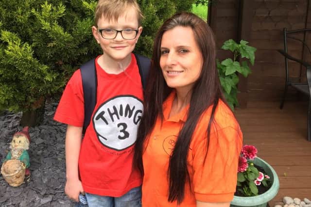 Liz Procter and her nephew, Sam.Liz is doing a 'wing walk' for Sam's Haven