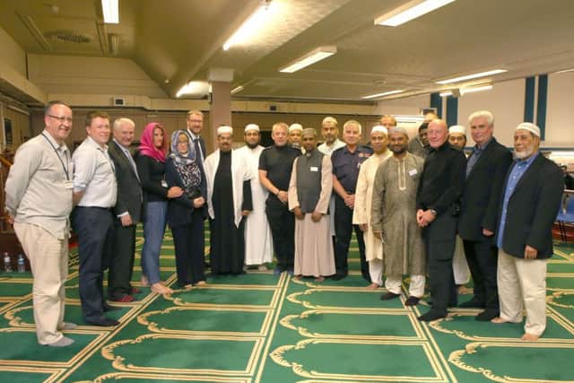 Members of the Muslim community, representatives if Hampshire fire and rescue, Cllr Gerald Vernon-Jackson and the editor of The News, Mark Waldron
Picture: Habibur Rahman