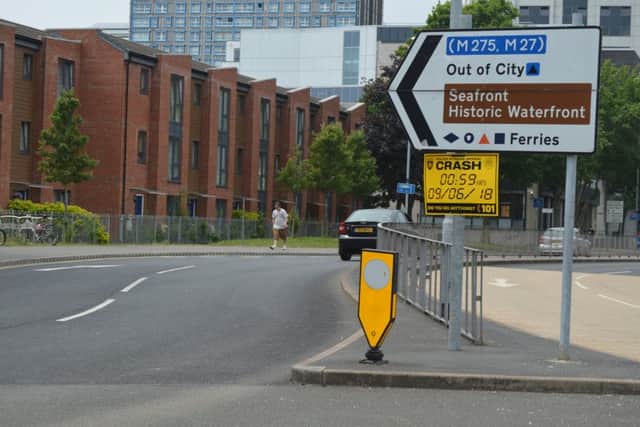 A police sign at the scene of the fatal crash in Winston Churchill Avenue, Portsmouth Picture: David George