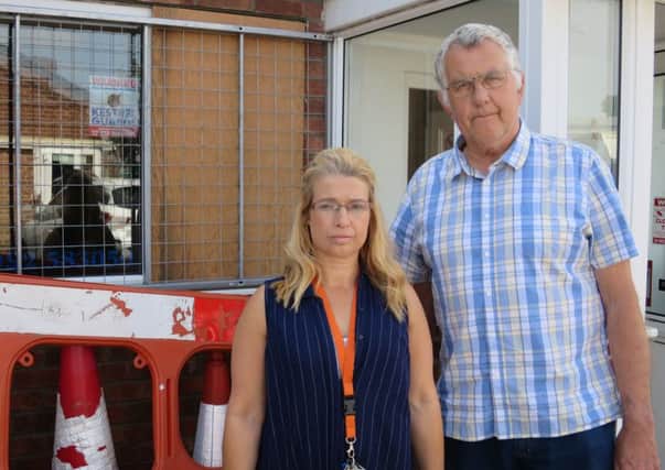 Lorraine and Stuart Pottinger outside Jacob's Well Care Centre in Toronto Place in Gosport after it was burgled