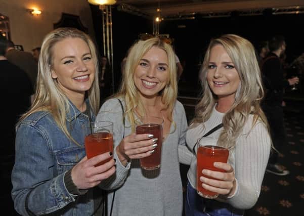 Punters Amy Davies, Katie Mendonca and Emma Lawley enjoy drinks at Portsmouth Beer festival. Picture: Ian Hargreaves