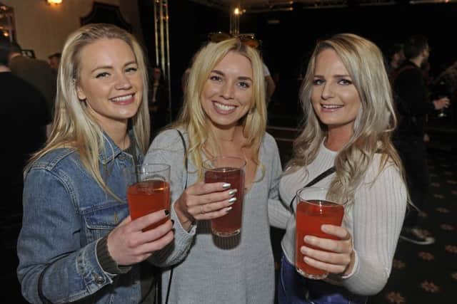 Punters Amy Davies, Katie Mendonca and Emma Lawley enjoy drinks at Portsmouth Beer festival. Picture: Ian Hargreaves