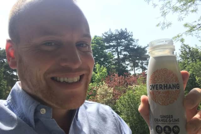Kieran OConnor, Transalis business development consultant, with a bottle of Overhang